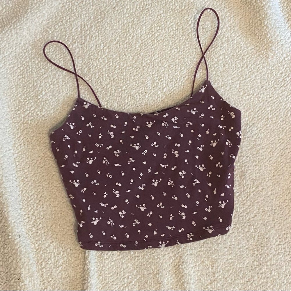 Cute little tank with a white flower design
